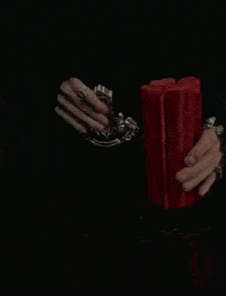 CANDLE (WITH A MYSTERY RING)