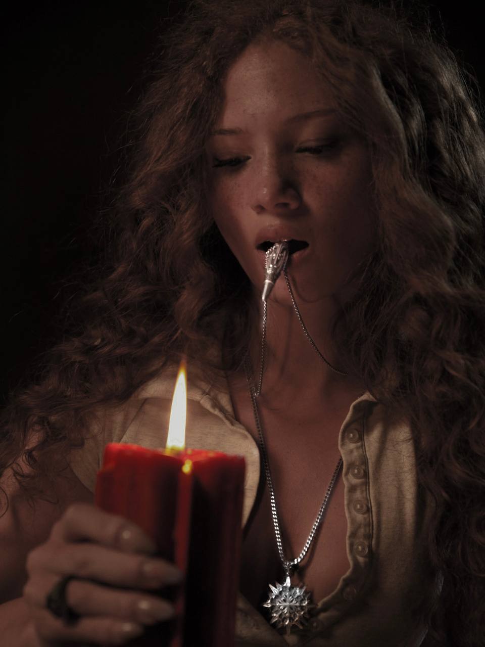 CANDLE (WITH A MYSTERY RING)
